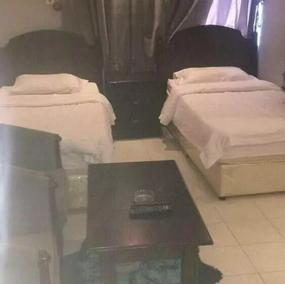 هتل Altoot Palace Furnished Apartments 3