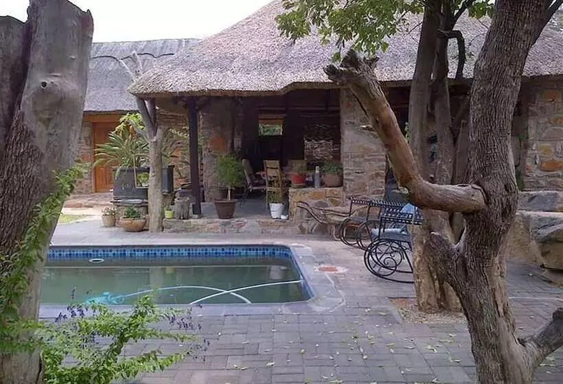 هتل A New Earth Guest Lodge