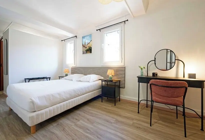 Hotelli Hôtel En Ville