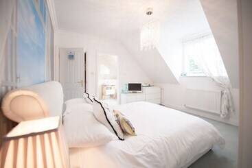 مبيت وإفطار Pinewood Lodge