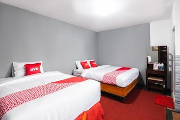 Hotell Oyo 1765 Herman Homestay