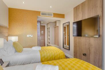 Апарт-отель Dwell City Living