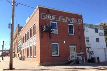 Pension (Hôtel basse catégorie) Caldwell Messenger Suites