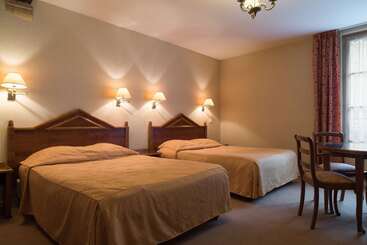 فندق Hostellerie Des Trois Pigeons