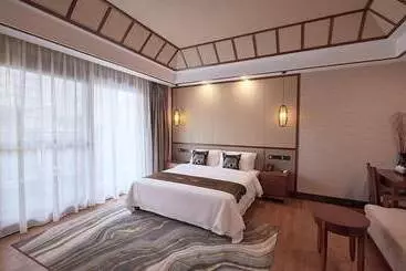 Hotelli Xishuangbana Yunshangpin