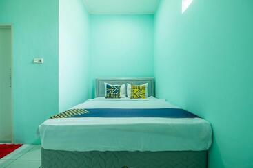 Hospedaria Spot On 1889 Mbuahpage