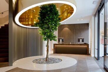 בית מלון כפרי Den Hof