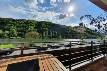 Römerstube Apartments & Rooms