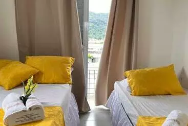 پانسیون Pousada Suites Enseada Guaruja