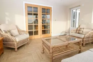 Mökkimajoitus Ty Top