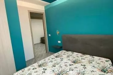 ツーリストアパートメント Suite Guesthouse A Pochi Passi Dal Mare