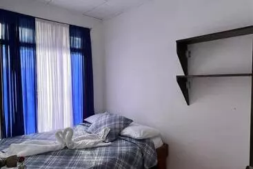 ベッドアンドブレックファースト Twin Palms Lodge