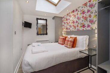 Apartamenty turystyczne Reubens Court And City Apartments