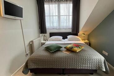 ホテル Bed & Brasserie Het Kosthuys