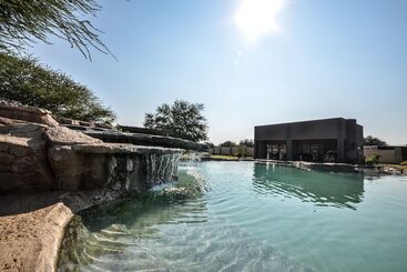 آپارتمان‌های توریست‌ها Monomotapa Village At Legend Golf & Safari Resort