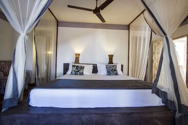 Отель Uzuri Boutique