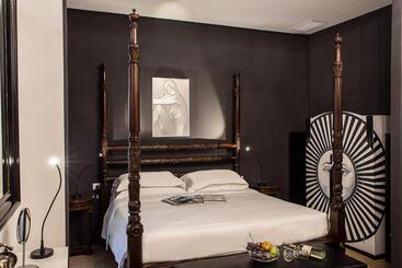 تختخواب و صبحانه Porcellino Gallery Art Boutique Bb