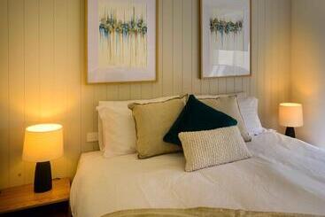 ホテル Georges Bay Apartments