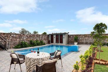 Stayvista S La Villa Farm   Tranquil Retreat With Outdoor Pool, Games & Terrace