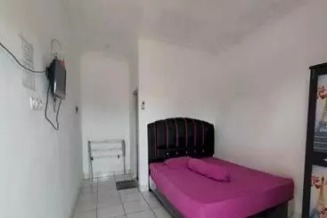 Hotel Oyo 93252 Garuda Bandara Guesthouse