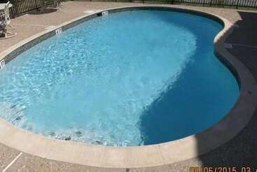 Отель Taylor Village Inn And Suites