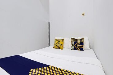 هتل Spot On 92257 Orchid Guest House