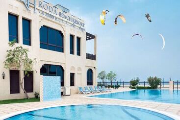 Отель Roda Beach Resort