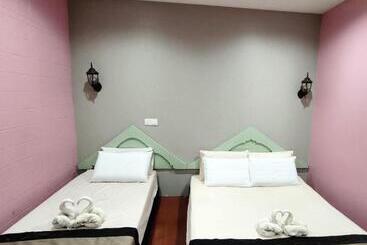 Отель Oyo 90906 Rumah Rehat Awana