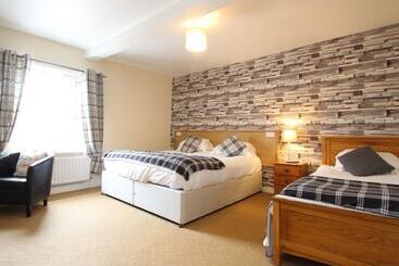 פנסיון Acorn Guest House