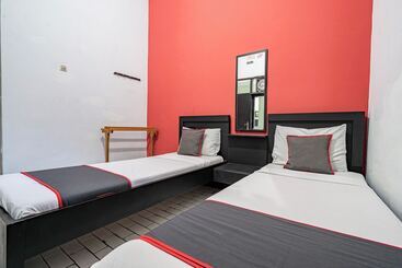 Capital O Hotel Abadi