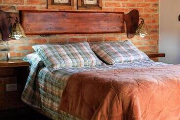 Appartement-hotel Cabañas Rio Manso