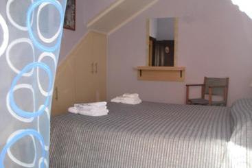 تختخواب و صبحانه Sa Domo De Minnanna