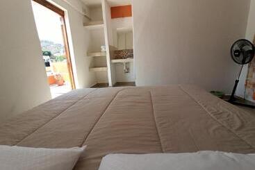 Отель Oaxaquita La Bella