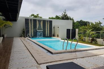 ホテル Capital O 261 Rumah Highlands