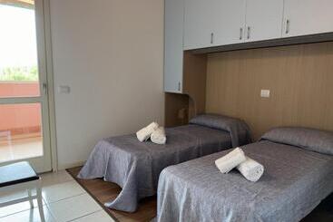 アパートホテル Airone Bianco Residence Village