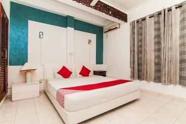 ホテル Oyo 115 Qi Mag Apartments