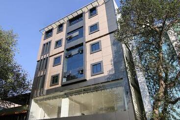 Hotel Capital O Champion Lotus Near Mantri Square Mall