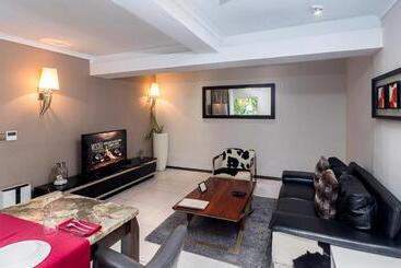 Red Mango Hotel And Apartments