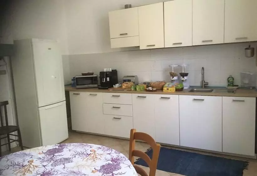 تختخواب و صبحانه La Magnolia