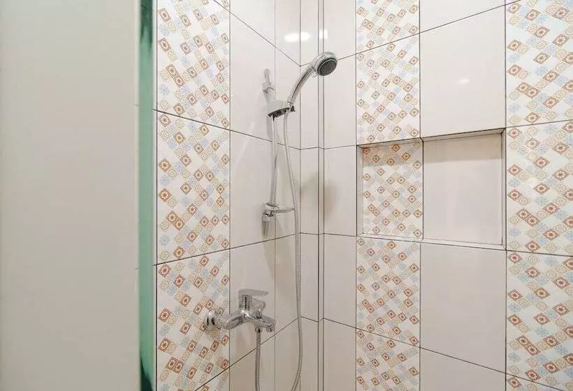 ホテル Reddoorz Syariah Near Universitas Serambi Mekkah