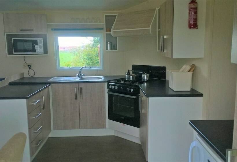 호텔 Axe Vale Caravan Park