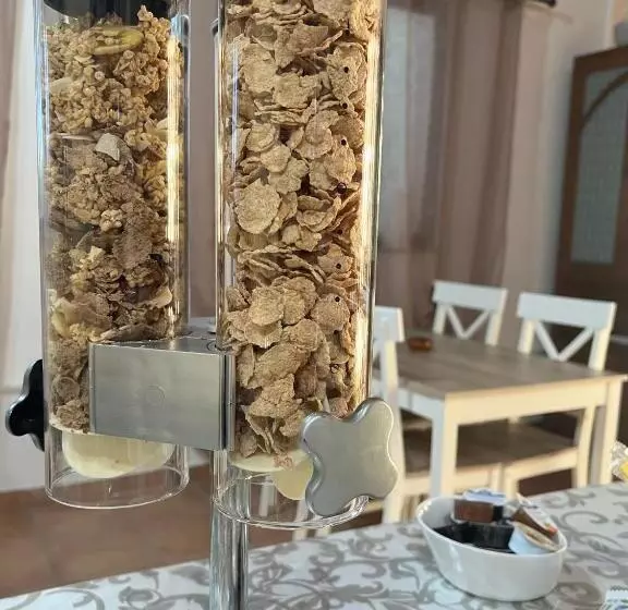 تختخواب و صبحانه Il Melarancio