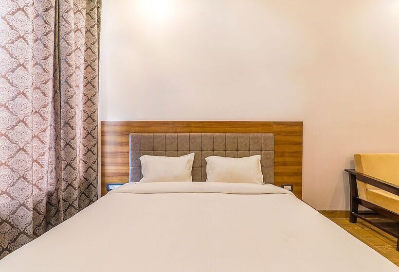 هتل Fabexpress Global Inn New