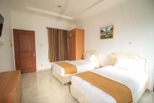 בית מלון כפרי Puri Sidikan Inn