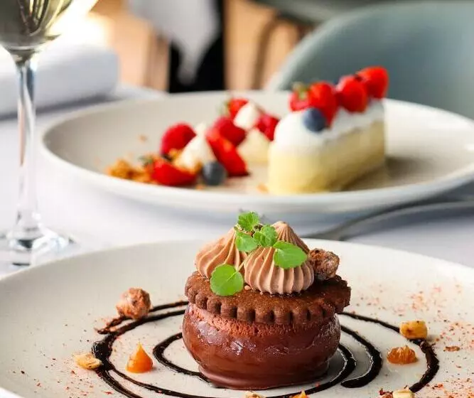 Hotelli L Ermitage Hôtel Cuisine à Manger