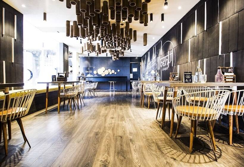 בית מלון כפרי Fab Prime Royal Plaza