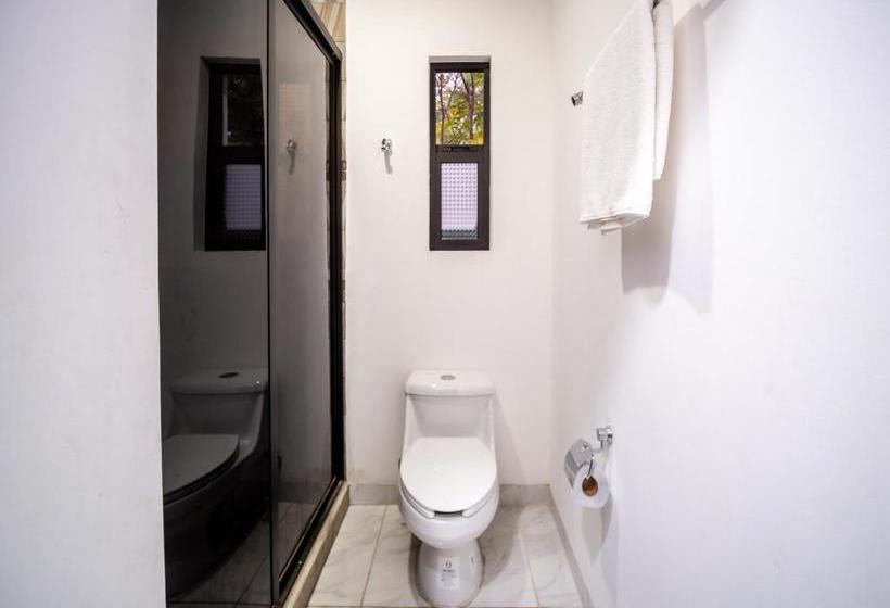 Отель Capital O  Mexicano Huatulco