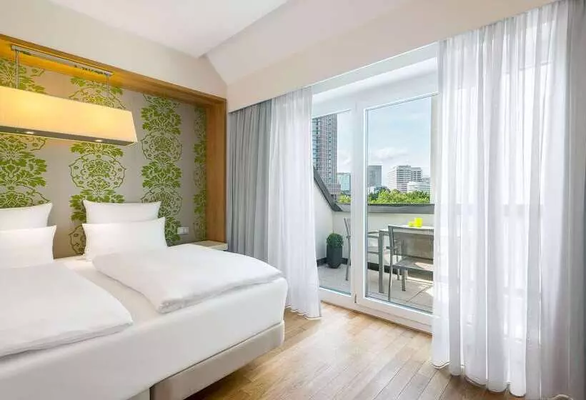 Отель NH Frankfurt Messe