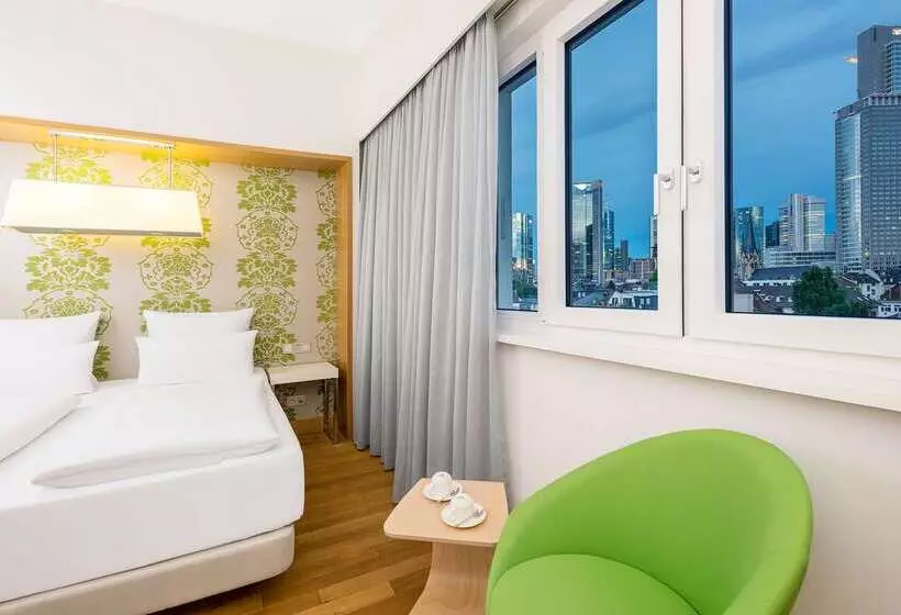 Отель NH Frankfurt Messe