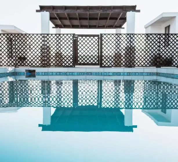 Collins Village Hotel Boutique